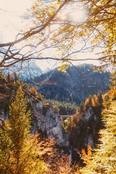 Beautiful nature of European Alps, landscape view of alpine mountains, lake and village in autumn season, travel and destination scenery