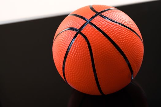 Basketball on a black and white background as a sports and fitness activity