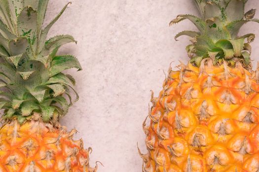 Tropical and Seasonal Summer Fruits. closeup pineapple arranged with blank space in the middle of  backgrounds, Healthy Lifestyle. Flat Lay