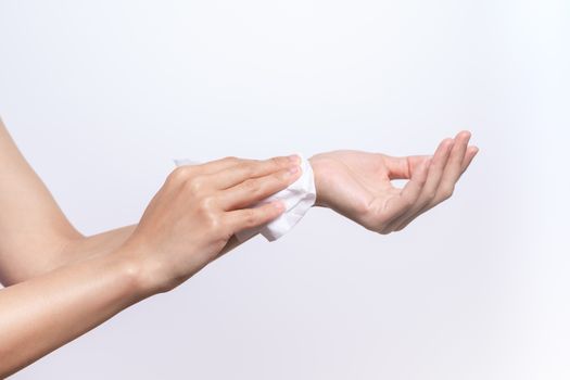 Woman cleaning her hands with white soft tissue paper. isolated on a white backgrounds