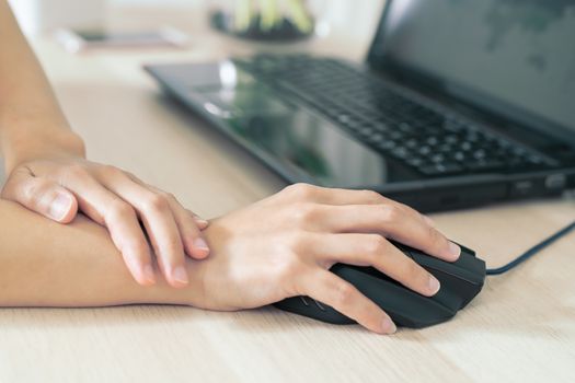 woman wrist arm pain long use mouse working. office syndrome healthcare and medicine concept