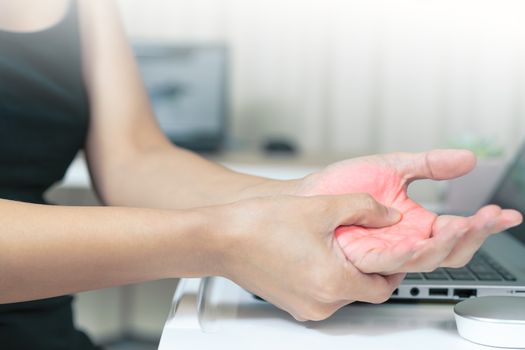 woman hand pain long use mouse working. office syndrome healthcare and medicine concept