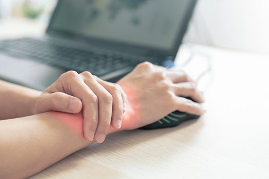 woman wrist arm pain long use mouse working. office syndrome healthcare and medicine concept