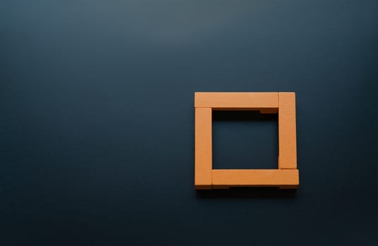 Teamwork concept. group of wooden square on the black backgrounds with copy space