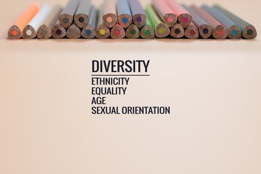 Diversity concept. row of mix color pencil on black background with text Diversity, Ethnicity, Equality, Age, Sexual Orientation