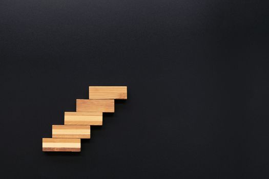 Wooden block stacking as step staircase. Business concept for growth successful. Blank for copy text