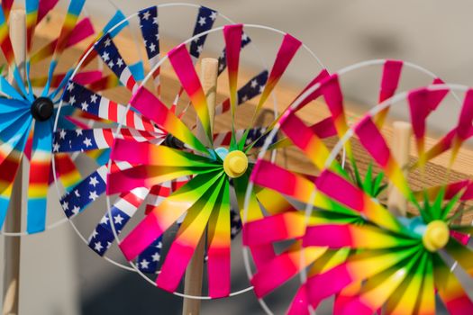 Close up the rainbow pinwheel toy, colorful turbines toy