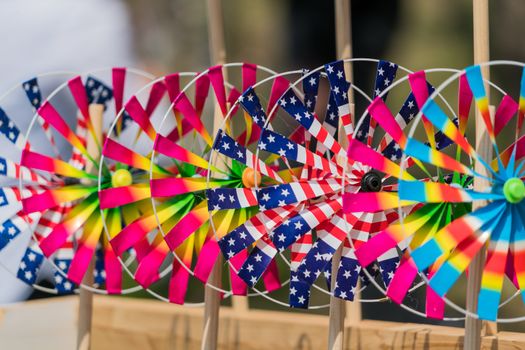 Close up the rainbow pinwheel toy, colorful turbines toy