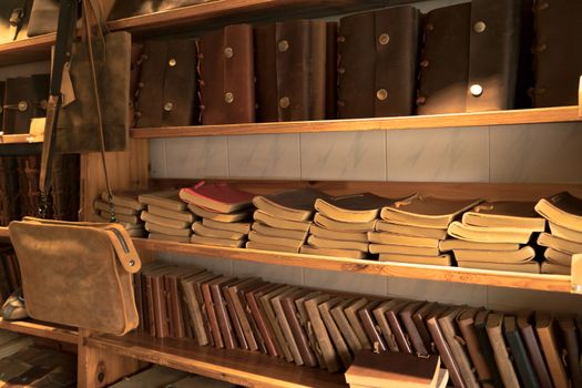 chinese books store, leather cover book on the bookshelf, old book on shelf