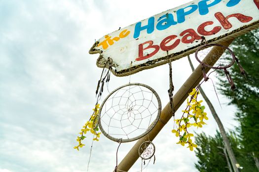 The happy beach tag at Koh Lipe island, Satun Thailand. Vacation at Adaman beach