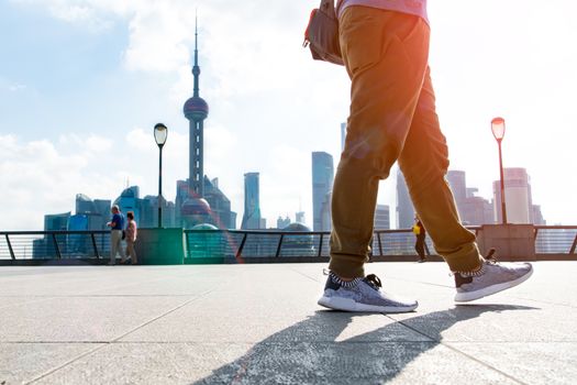 SHANGHAI CHINA OCT,2017: walking man in the summer at bund Shanghai city view background