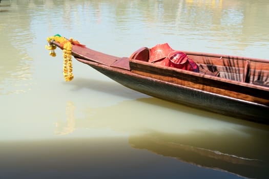 manual long tail boat is parking on the nature liver