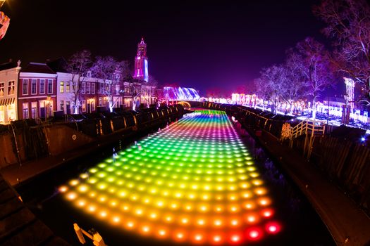 NAGASAKI, JAPAN - April 29, 2019 : Huis Ten Bosch is a theme park in Nagasaki, Japan, which displays old Dutch buildings and colorful lights show at night.