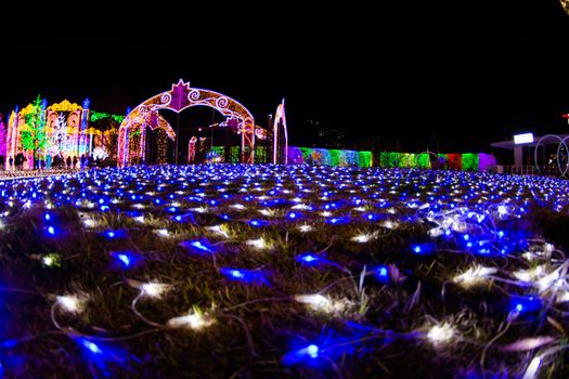 NAGASAKI, JAPAN - April 29, 2019 : Huis Ten Bosch is a theme park in Nagasaki, Japan, which displays old Dutch buildings and colorful lights show at night.