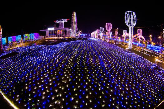 NAGASAKI, JAPAN - April 29, 2019 : Huis Ten Bosch is a theme park in Nagasaki, Japan, which displays old Dutch buildings and colorful lights show at night.