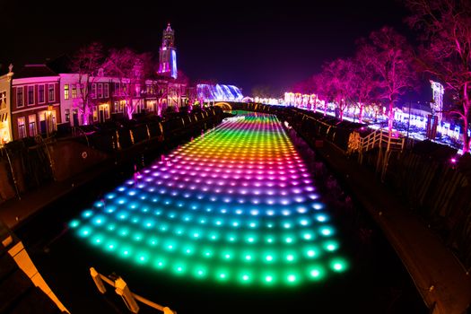 NAGASAKI, JAPAN - April 29, 2019 : Huis Ten Bosch is a theme park in Nagasaki, Japan, which displays old Dutch buildings and colorful lights show at night.