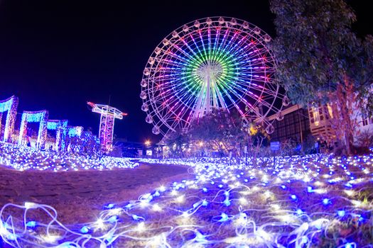 NAGASAKI, JAPAN - April 29, 2019 : Huis Ten Bosch is a theme park in Nagasaki, Japan, which displays old Dutch buildings and colorful lights show at night.