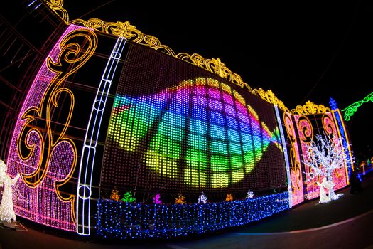 NAGASAKI, JAPAN - April 29, 2019 : Huis Ten Bosch is a theme park in Nagasaki, Japan, which displays old Dutch buildings and colorful lights show at night.