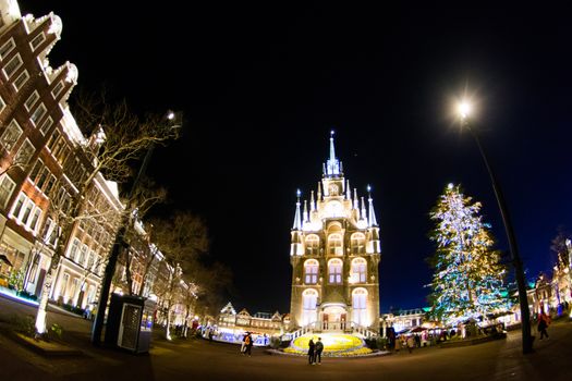 NAGASAKI, JAPAN - April 29, 2019 : Huis Ten Bosch is a theme park in Nagasaki, Japan, which displays old Dutch buildings and colorful lights show at night.