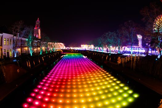 NAGASAKI, JAPAN - April 29, 2019 : Huis Ten Bosch is a theme park in Nagasaki, Japan, which displays old Dutch buildings and colorful lights show at night.