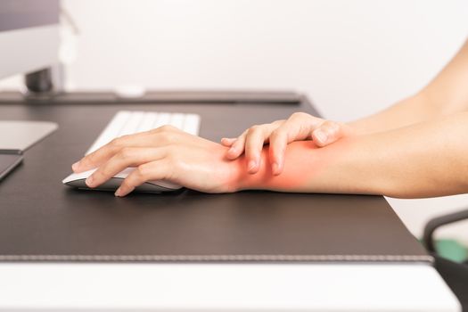 woman wrist hand arm pain long use mouse working. office syndrome healthcare and medicine concept