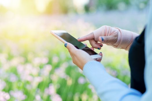 young student women shopping online on smartphone while wrist hand pain. business and modern lifestyle concept