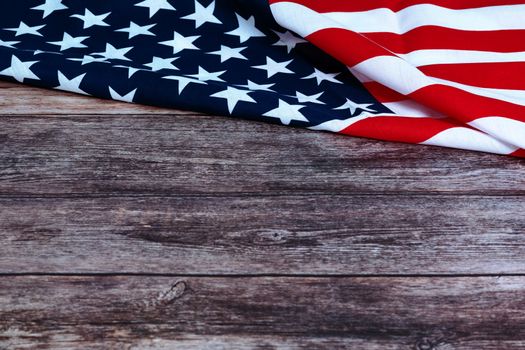 Memorial Day with American flag and flower on wooden background