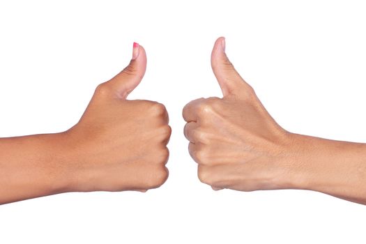 Female hands making signals with the thumb up