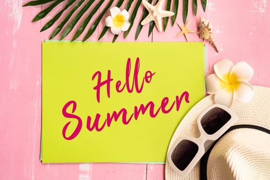 Beautiful summer holiday, Beach accessories, sea shells, hat, sunglasses and palm leave on paper for copy space