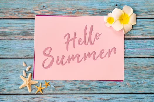 Beautiful summer holiday, Beach accessories, seashells and flower on paper for copy space