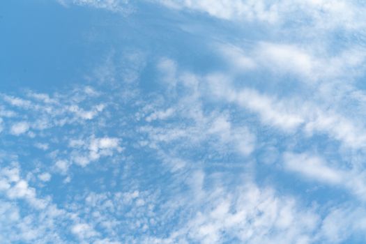 white soft cloud texture on blue sky backdrop