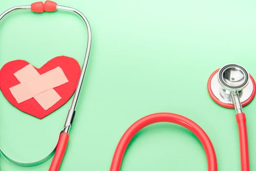 healthcare and medicine stethoscope and red heart symbol healthy and insurance world health day concept