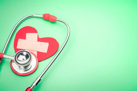 healthcare and medicine stethoscope and red heart symbol healthy and insurance world health day concept