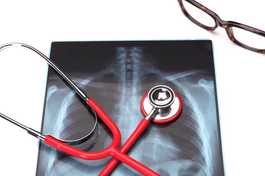 world health day healthcare and medicine red stethoscope on x-ray film healthy and insurance concept - isolated