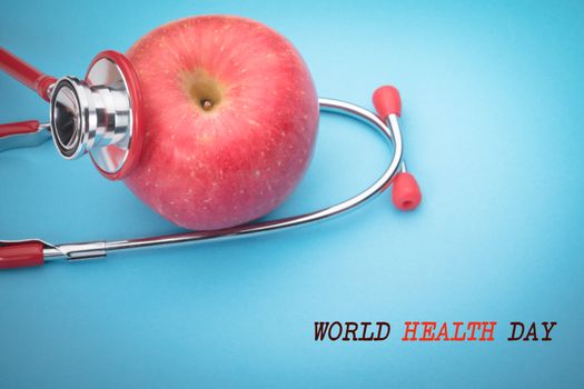world health day healthcare and medicine stethoscope and red apple healthy and insurance concept