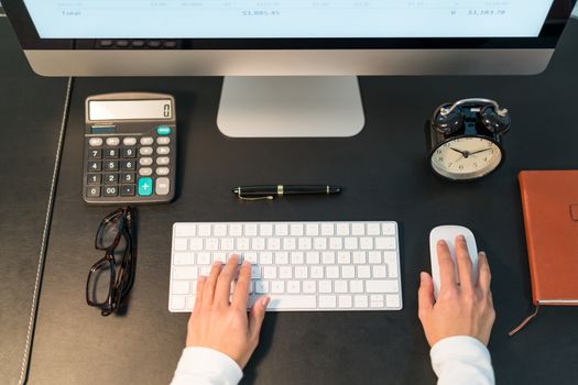 young business women working on desktop computer at office top view
