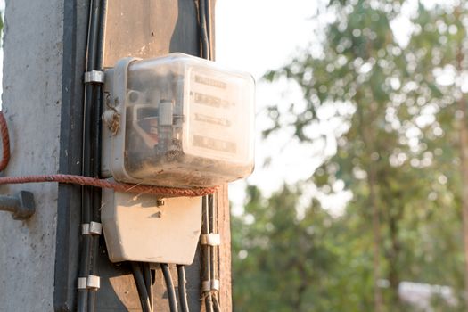 electric meter on the pole the rural electricity power distribute of Thailand