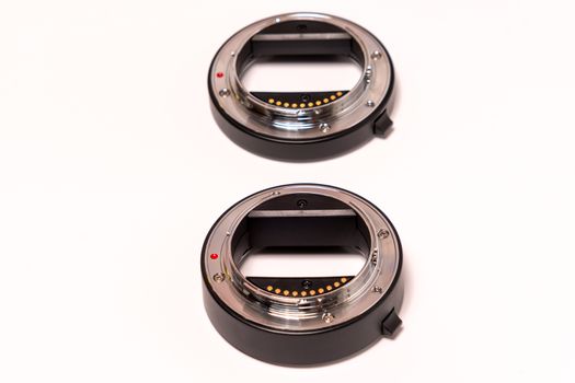 double ring macro extension tube on white background