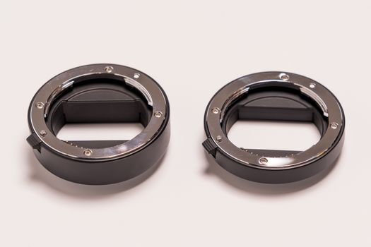 double ring macro extension tube on white background