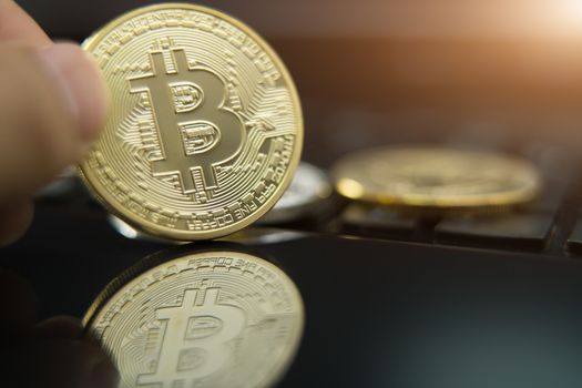 cryptocurrency coins - Litecoin, Bitcoin, Ethereum, Ripple cryptocurrency concept stock of physical bitcoins gold and silver coins