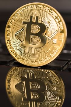 cryptocurrency coins - Bitcoin, Litecoin, Ethereum, Ripple cryptocurrency concept stock of physical bitcoins gold and silver coins