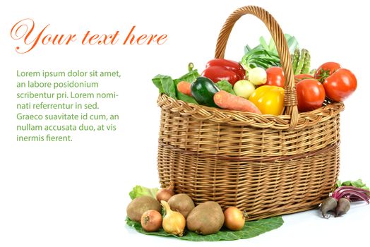 Healthy eating concept - basket full of varied fresh vegetables and a place for your advertising text