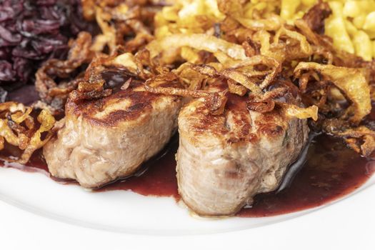 swabian pork fillets with spaetzle on a plate