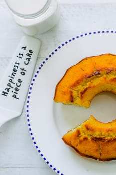 Organic corn cake and white plate on white wooden table