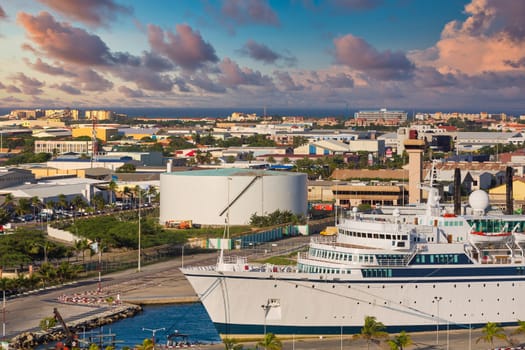 White Luxury cruise ship in port in Aruba