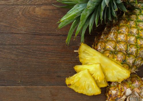 Pineapple on wooden background