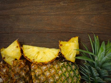 Pineapple on wooden background