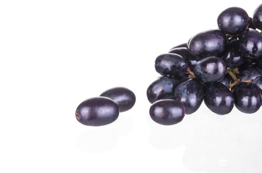 Fresh seedless grapes isolated on white background.