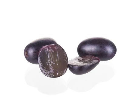 Fresh seedless grapes isolated on white background.