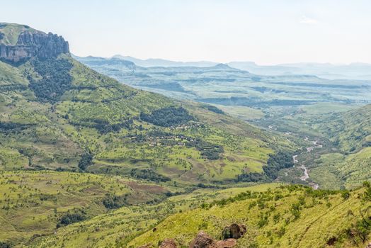 View from the Policemans Helmet towards the South. Thendele Camp , the Tugela River and a hiker are visible